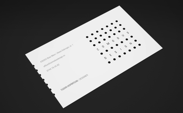 identity comodus design black White dots