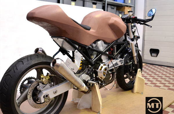 motorcycle racer sketching Clay Modeling foam shaping cafe racer