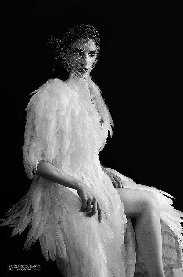 bird feathers swan coat woman