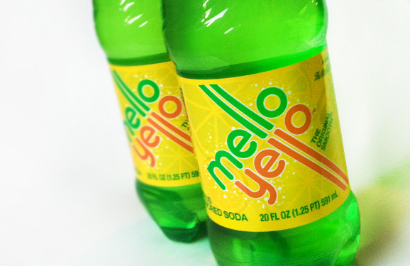 Coca Cola citrus Mello Yello drink logo identity Retro type smooth soda 70's Original font yellow cola