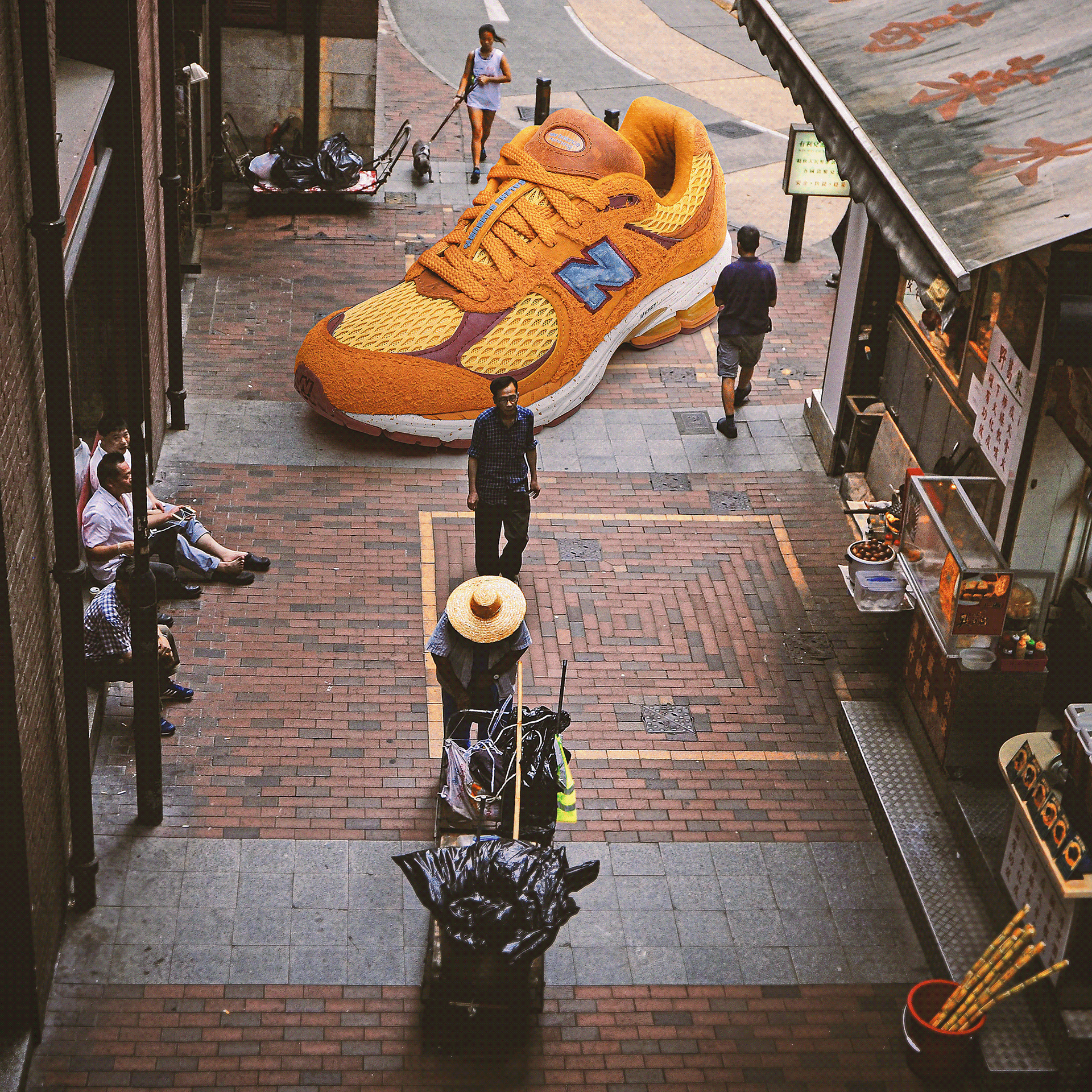 This is a photo composite made with Photoshop of a giant sneaker at an asian alleyway.