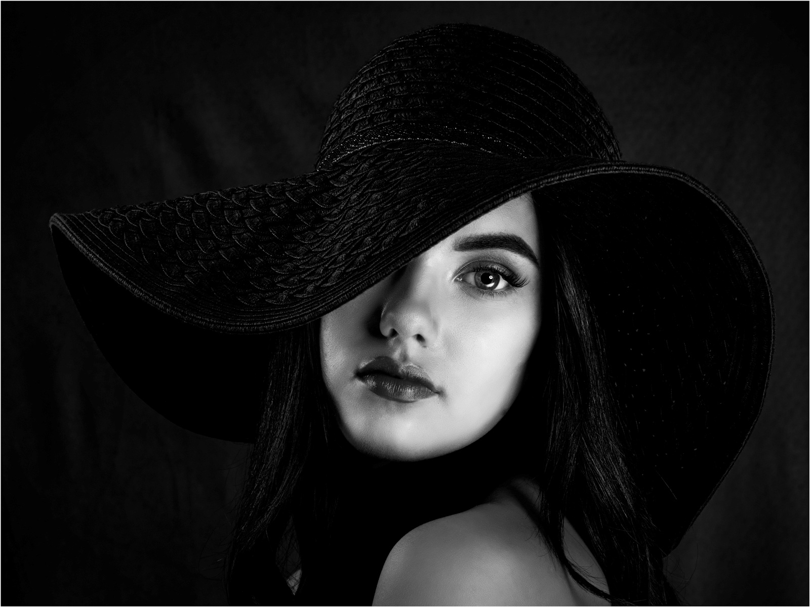 Sophie in a hat in mono