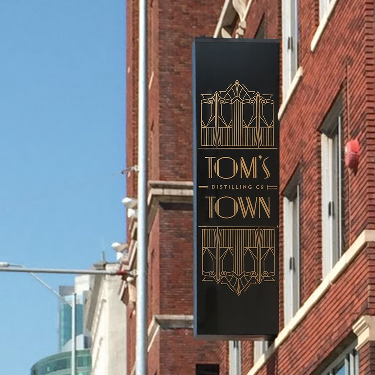 Tom's Town Branding