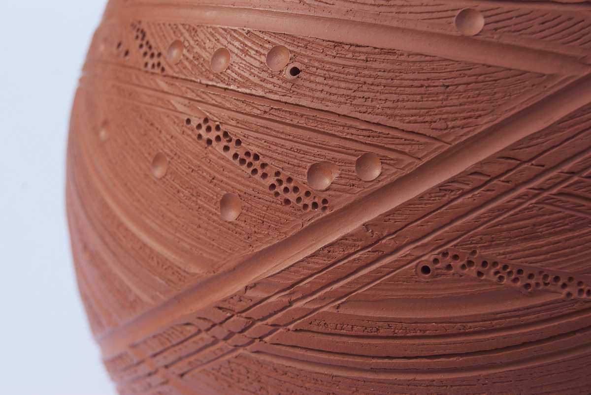 terracotta pot surface ornamentation cosmos Musical Instrument Pottery ceramics  design clay