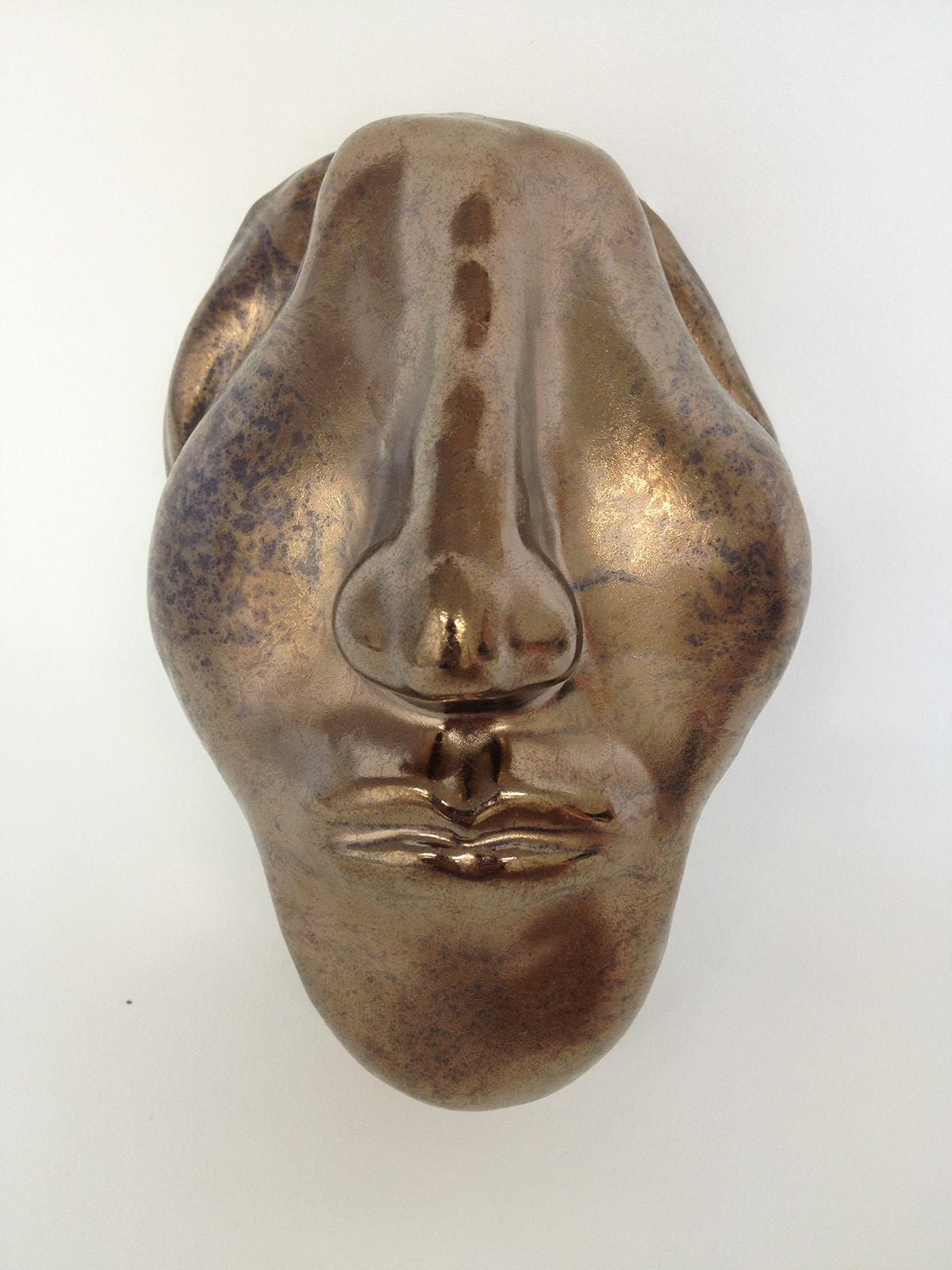 bronze ceramic clay face abstract