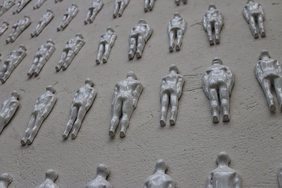 sculpture terracotta Pottery installation wall White unanime figure identity human