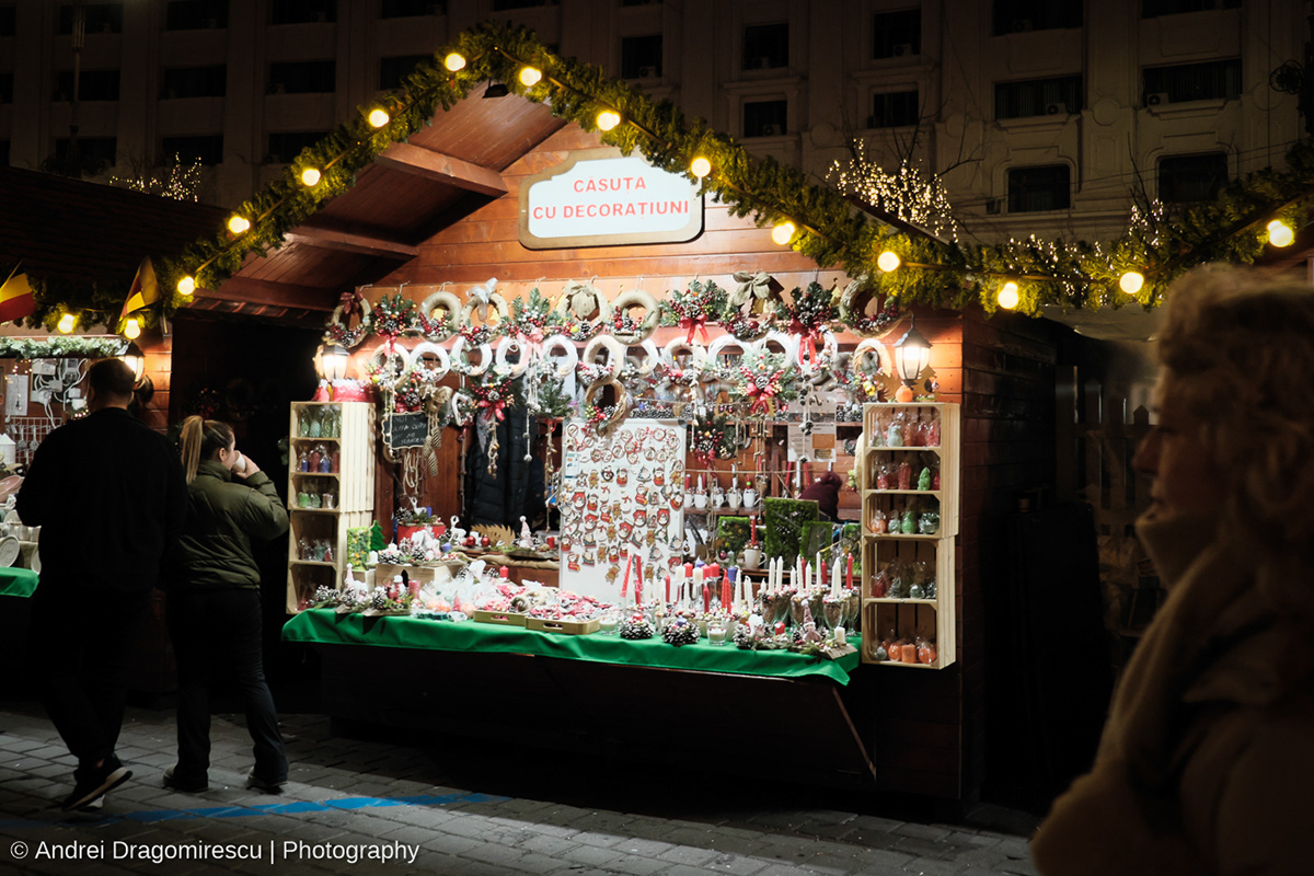 Christmas Fair gifts people lights night crowd Urban city Street