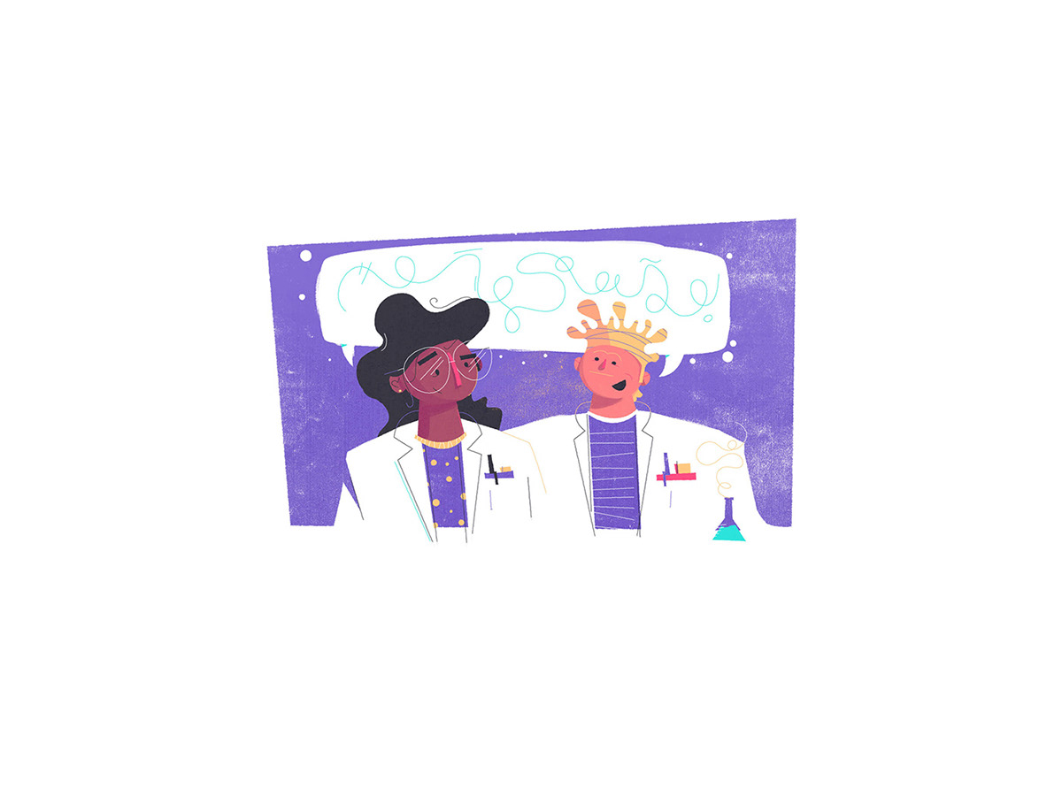 a male and female scientist smiling at one another in lab coats