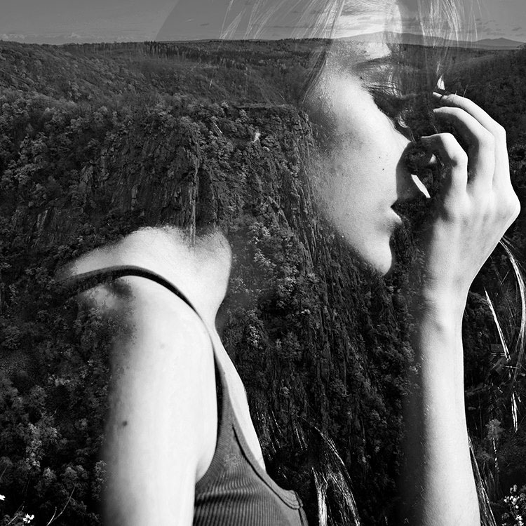 double exposure black and white self-portrait conceptual