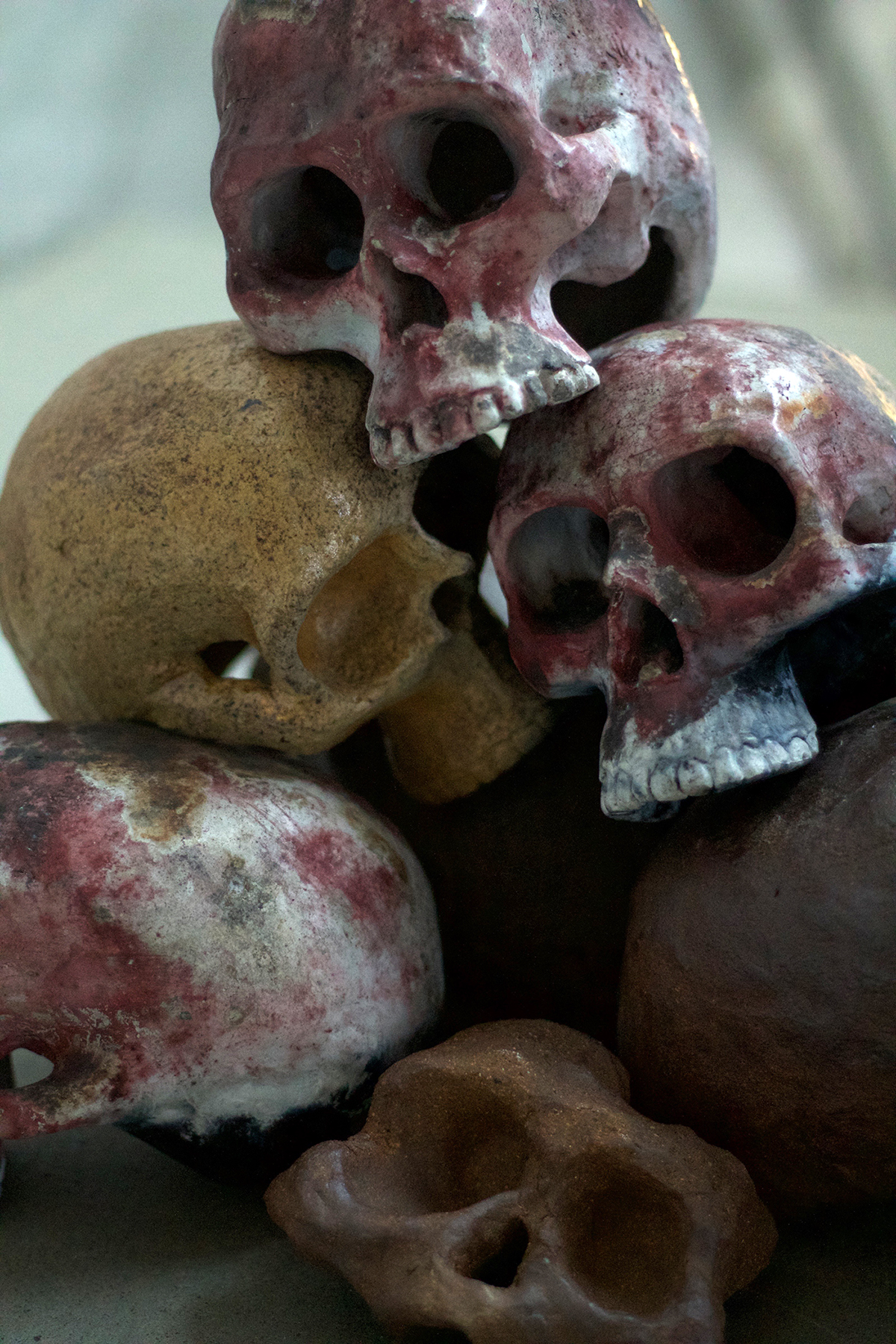 ceramic scultpure pit fire wood fire skulls morbid art undertaker death decay artifact