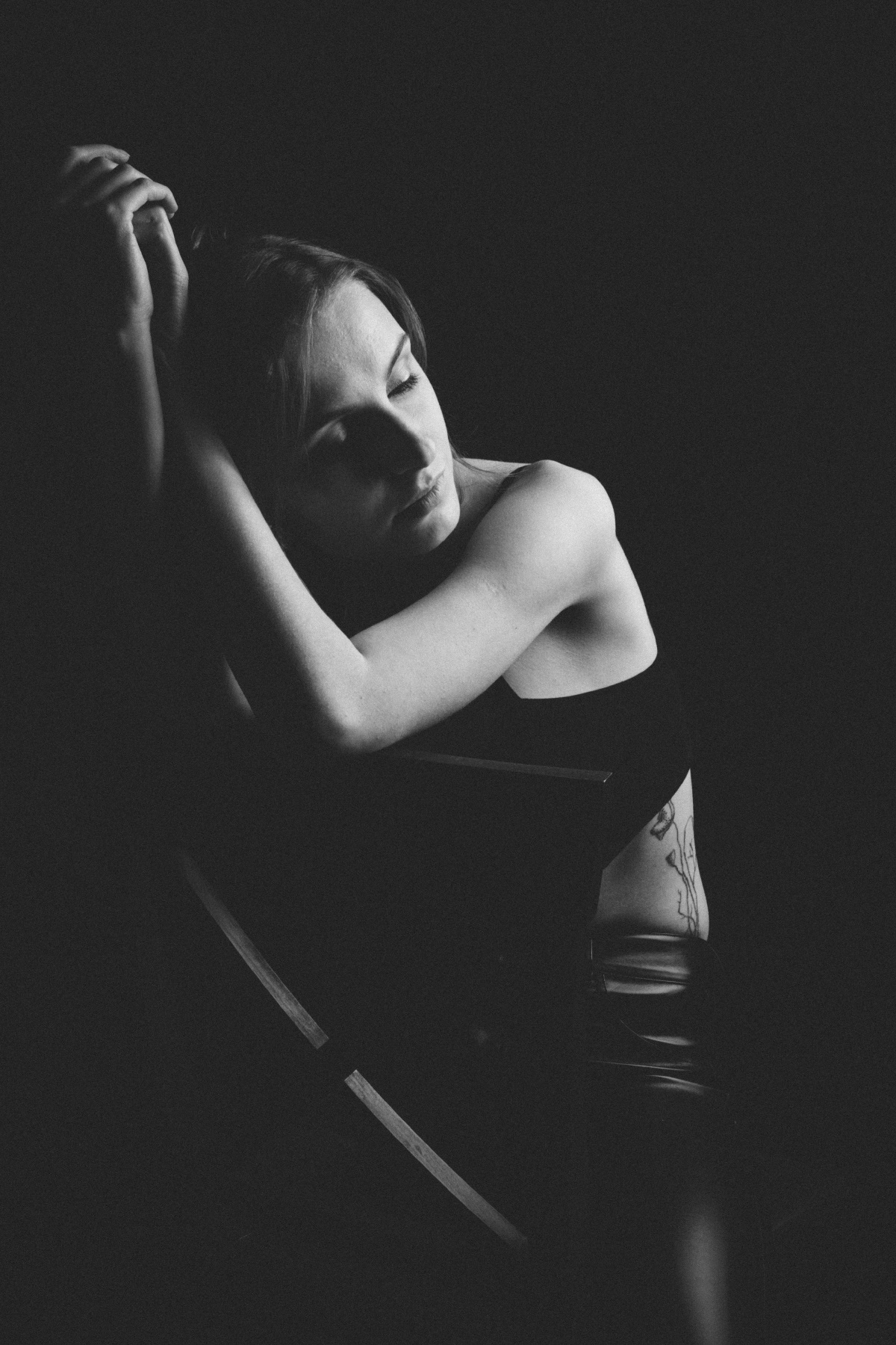 model light female portrait black and white studio girl posing