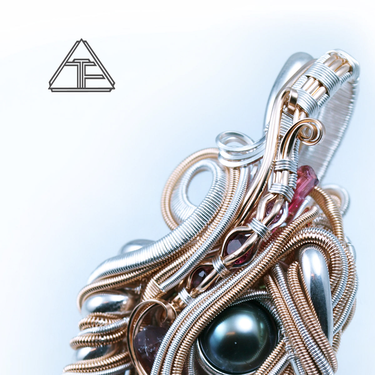 gold silver jewelry handmade seattle Wire wrap pendant tanzanite tourmaline black pearl pearl maori creative flow