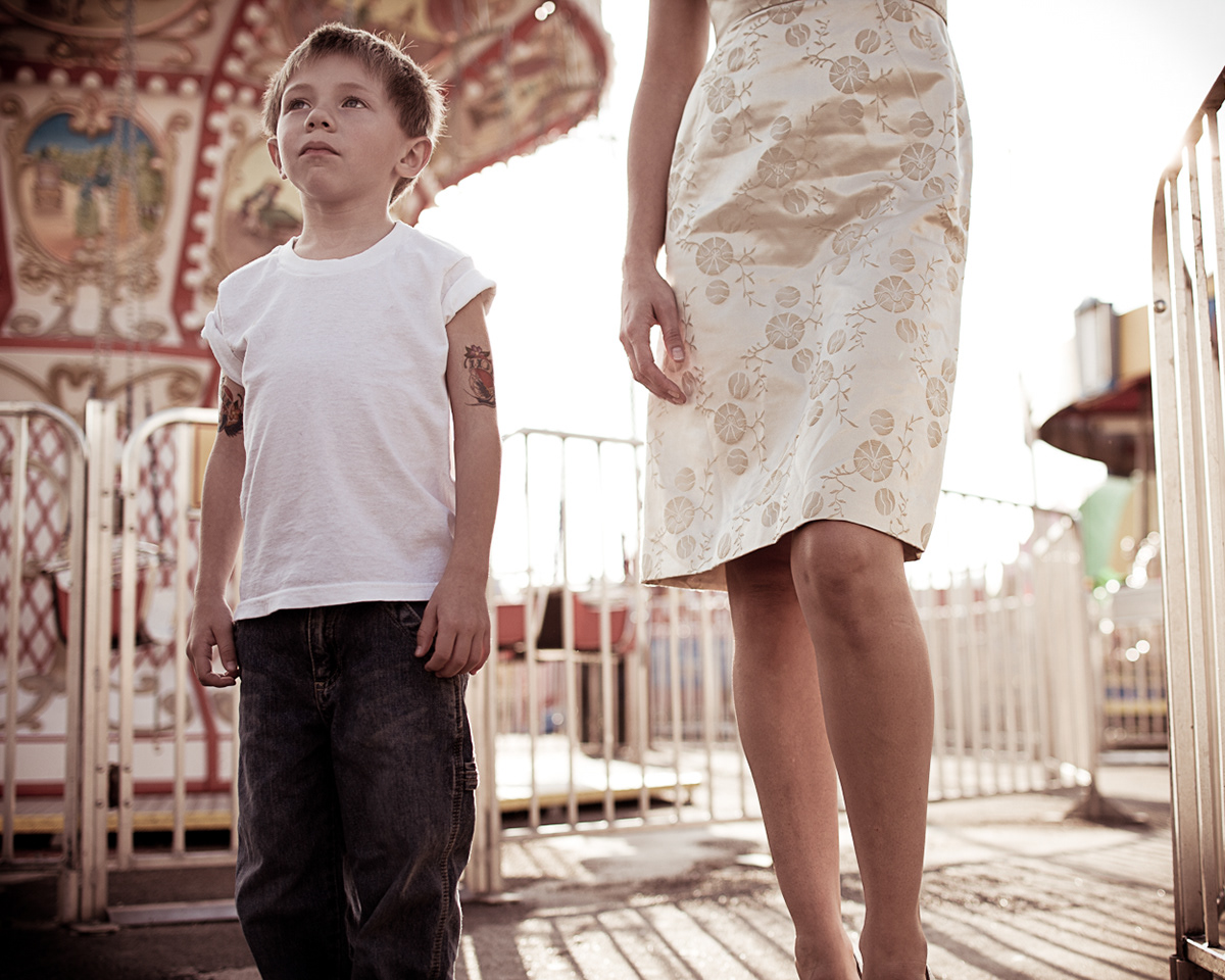 New York coney island child mother relationship disappointment expectations amusement park rides disaffected alone boy Photographing Childhood