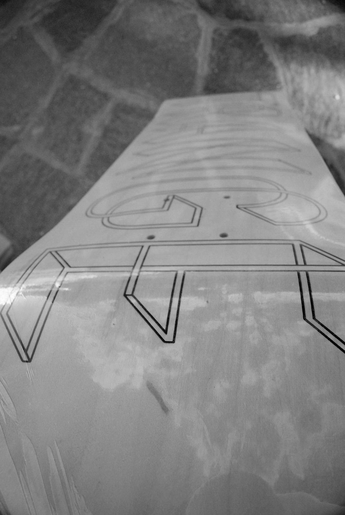 skateboards graphics strange lettering type impossible figure