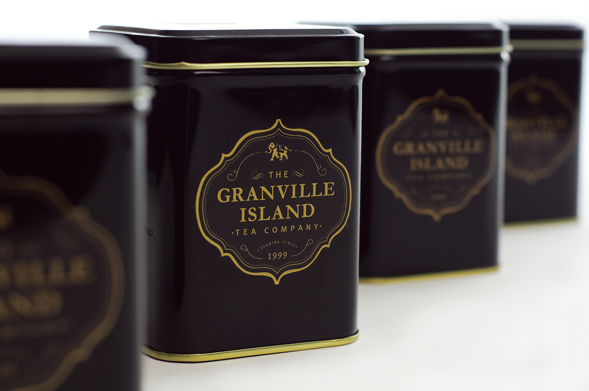 Teashop package tea tins black and gold heritage brand rebranding market brands
