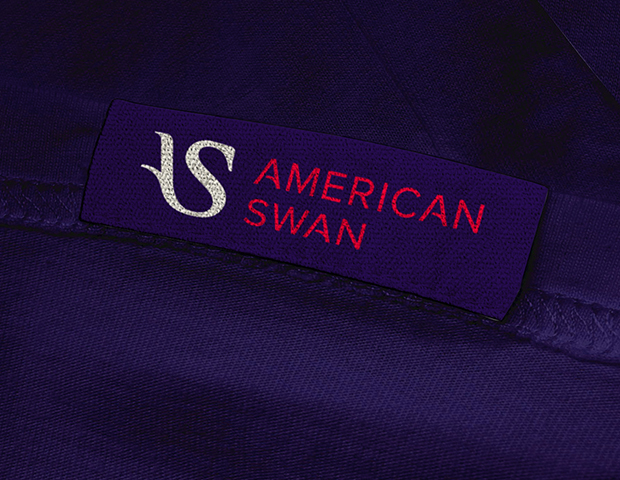 India Retail online american confidence logo swan monogram