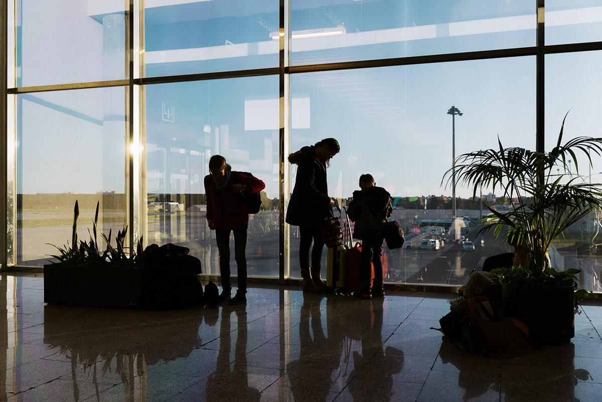 Adobe Portfolio gate airport plane Window reflection backlit Silhouette