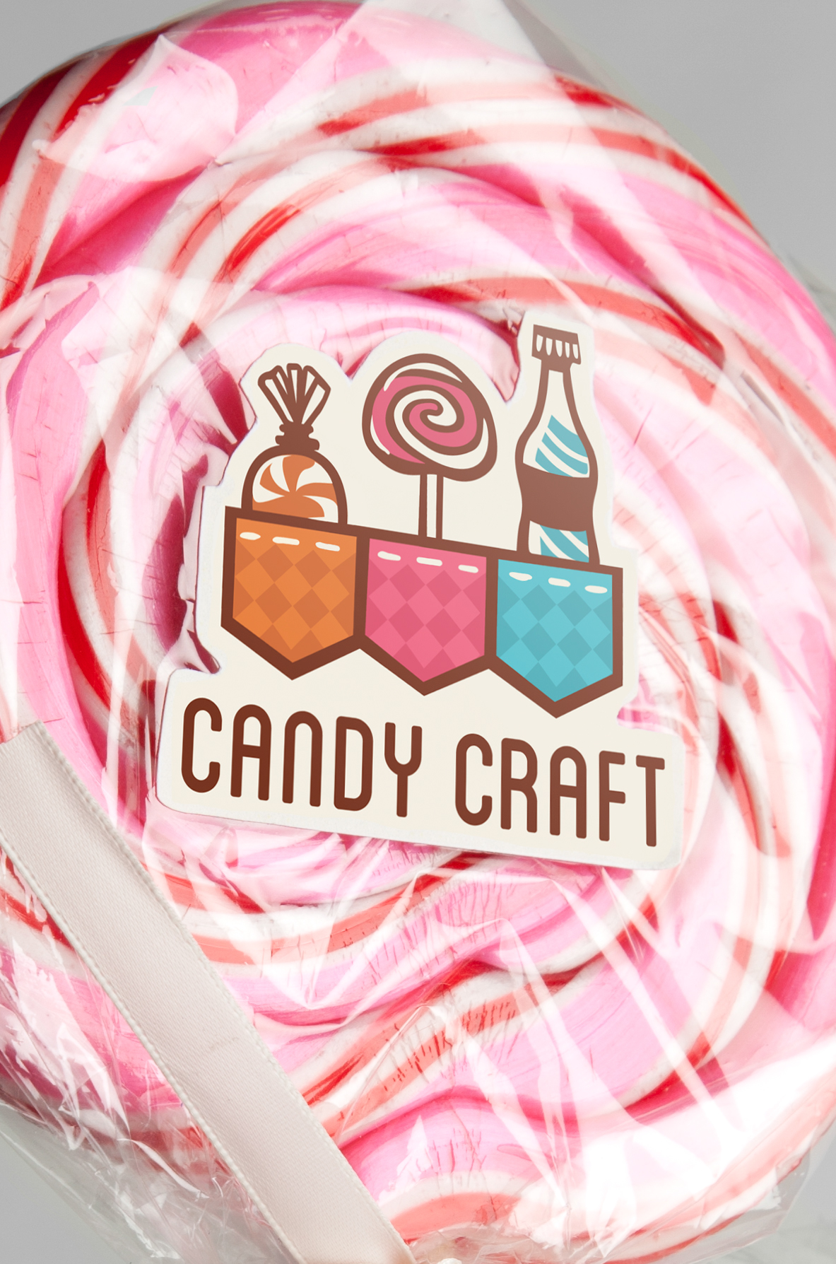 Candy Craft logo soda bottle wrapper Candy business card envelope standards manual colorful orange pink blue swirl bag lollipop