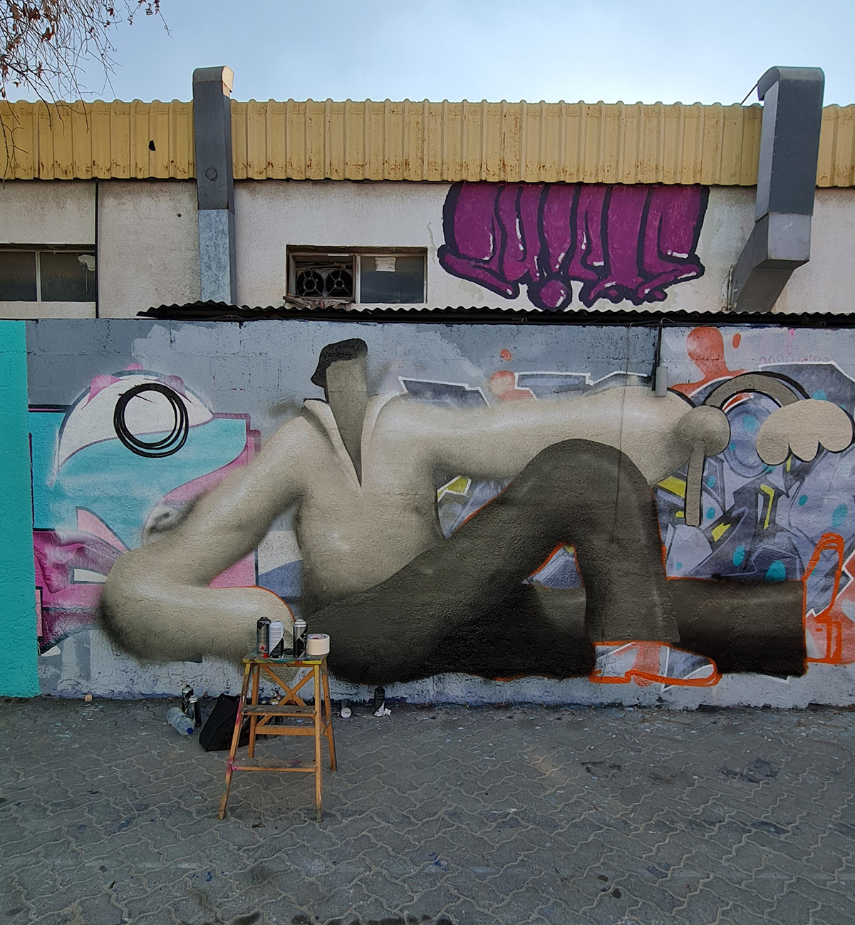 Graffiti Street Art  Mural dubai martynas auz minimal clean monochrome character mural dubaigraffiti