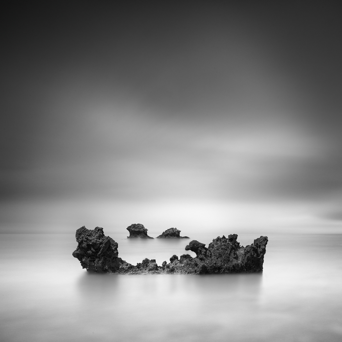 black and white fine ar long exposure rock seascape water