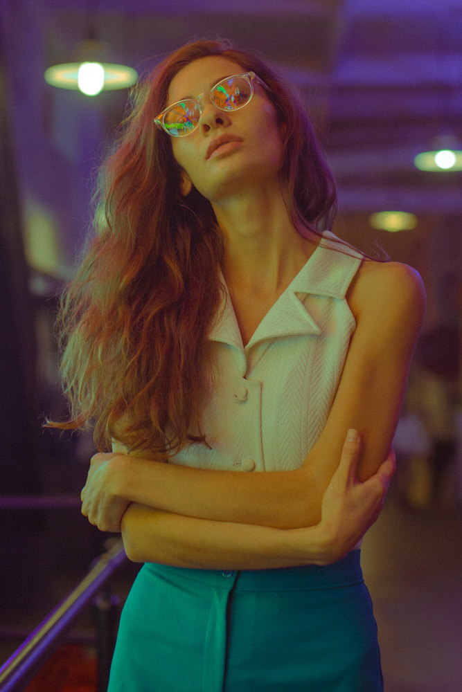 neon California Los Angeles model woman photoshoot colors warm books glasses