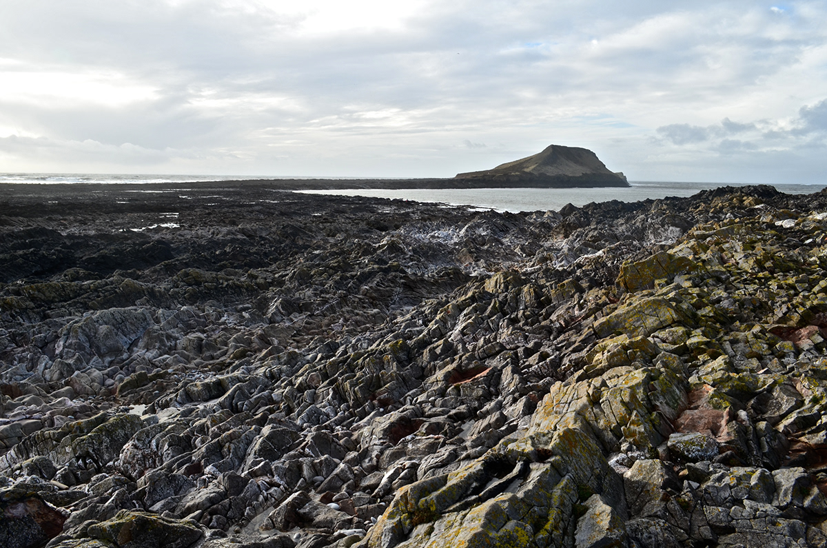 rocks erosion black and white sea wales geology