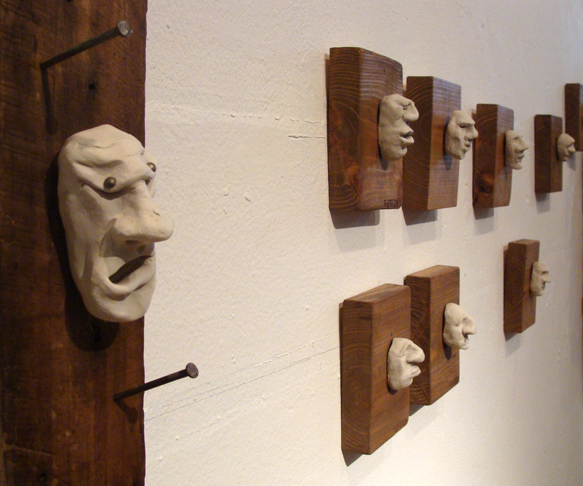 stecca Gerry Stecca clay heads hand made installation