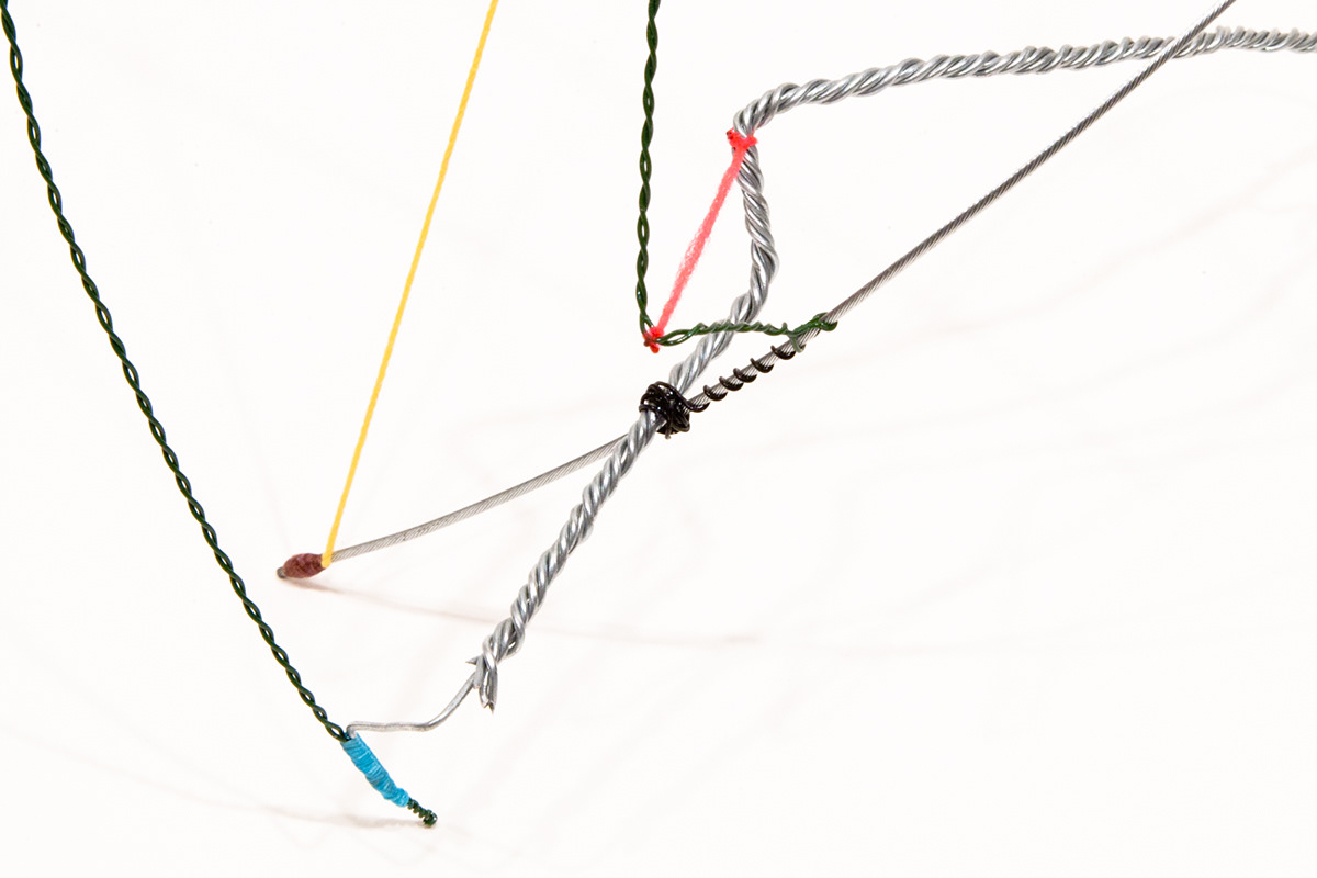 derailleur cable garden wire thread plastic galvanized wire. linear sculpture graphic colorful intricate tiny sculpture small scupture