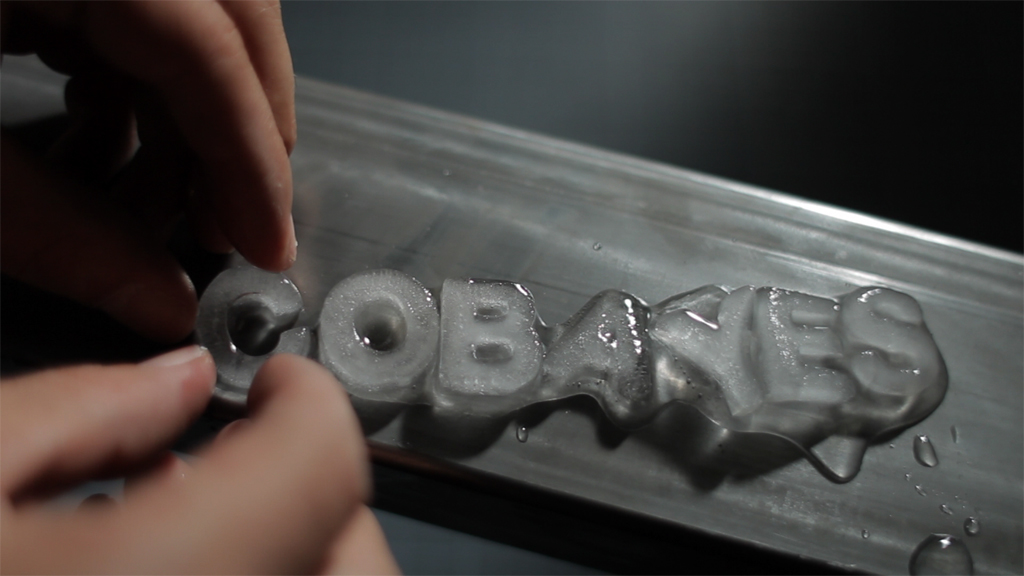 tv hand made font ice