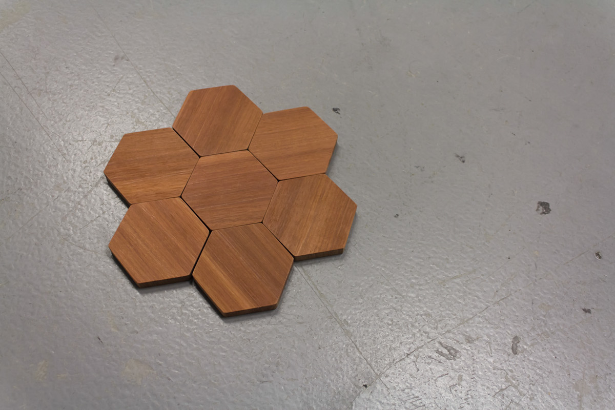 surface inlay hardwood pattern hexagon support negative space Structural