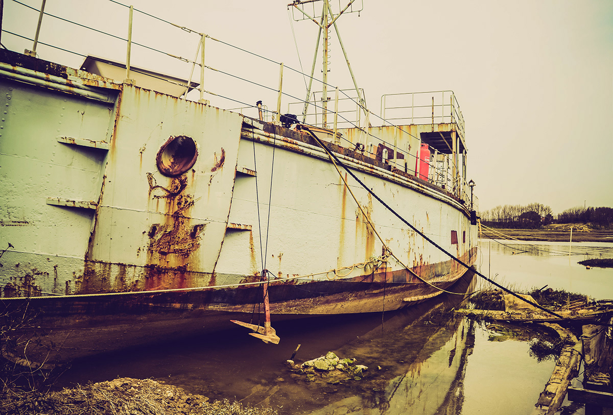Boats derelict abandoned ships water sea Ocean shipwrecked beach