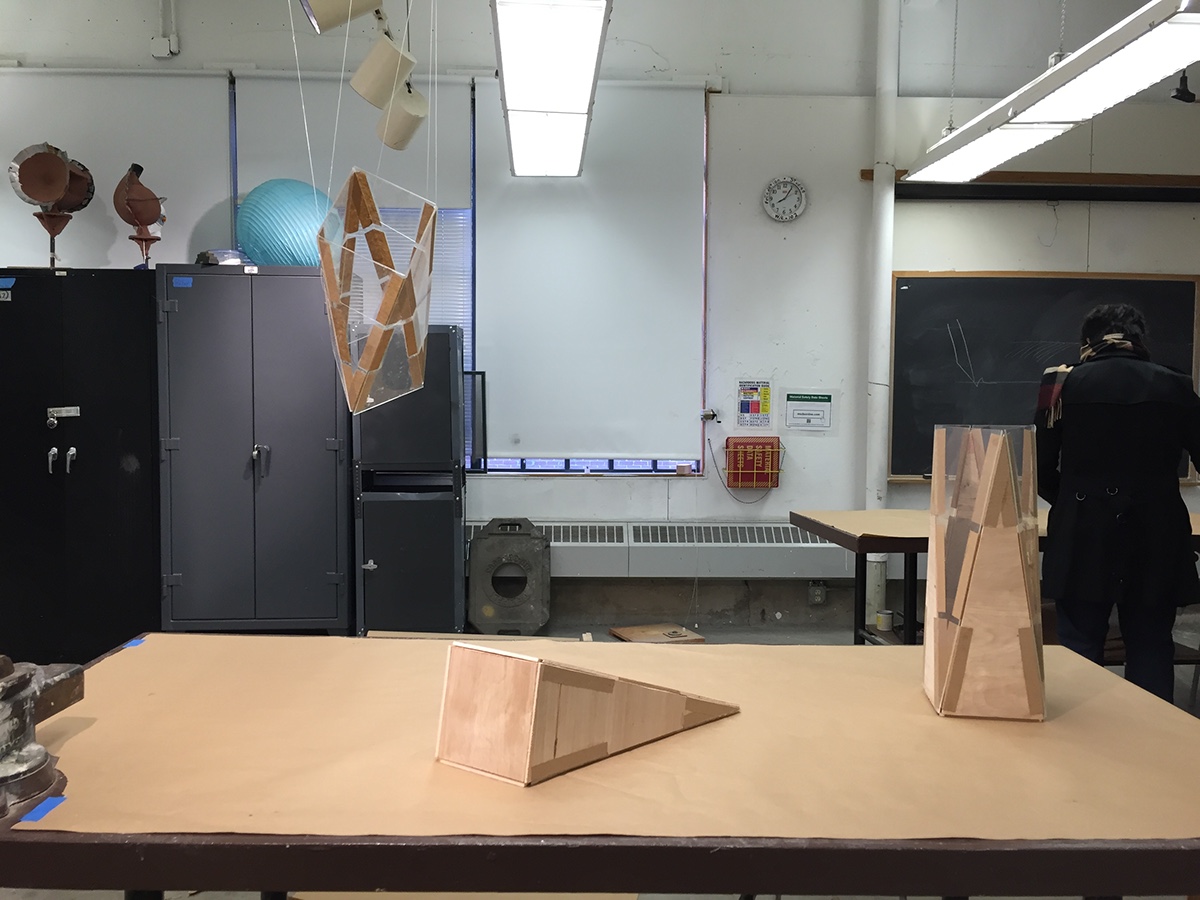 spatial class wood plexiglass kinetic sculpture