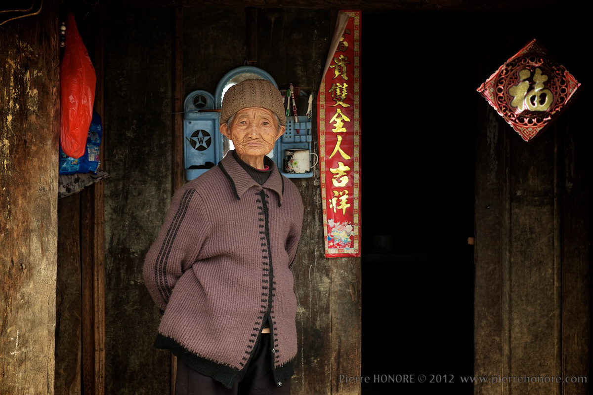 Minority china people portrait colors Yunnan eyes light Shadows close-up