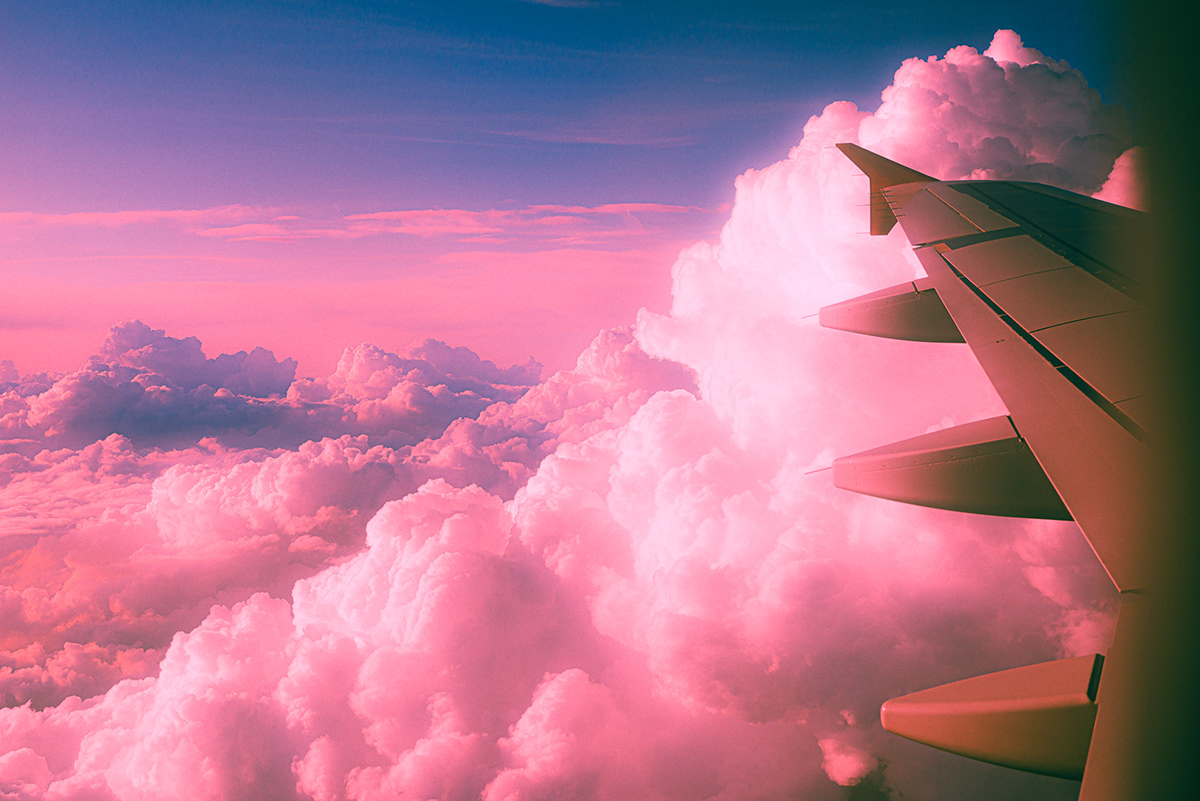 Aeroplane clouds dreamy glow neon pink SKY soft vivid colors