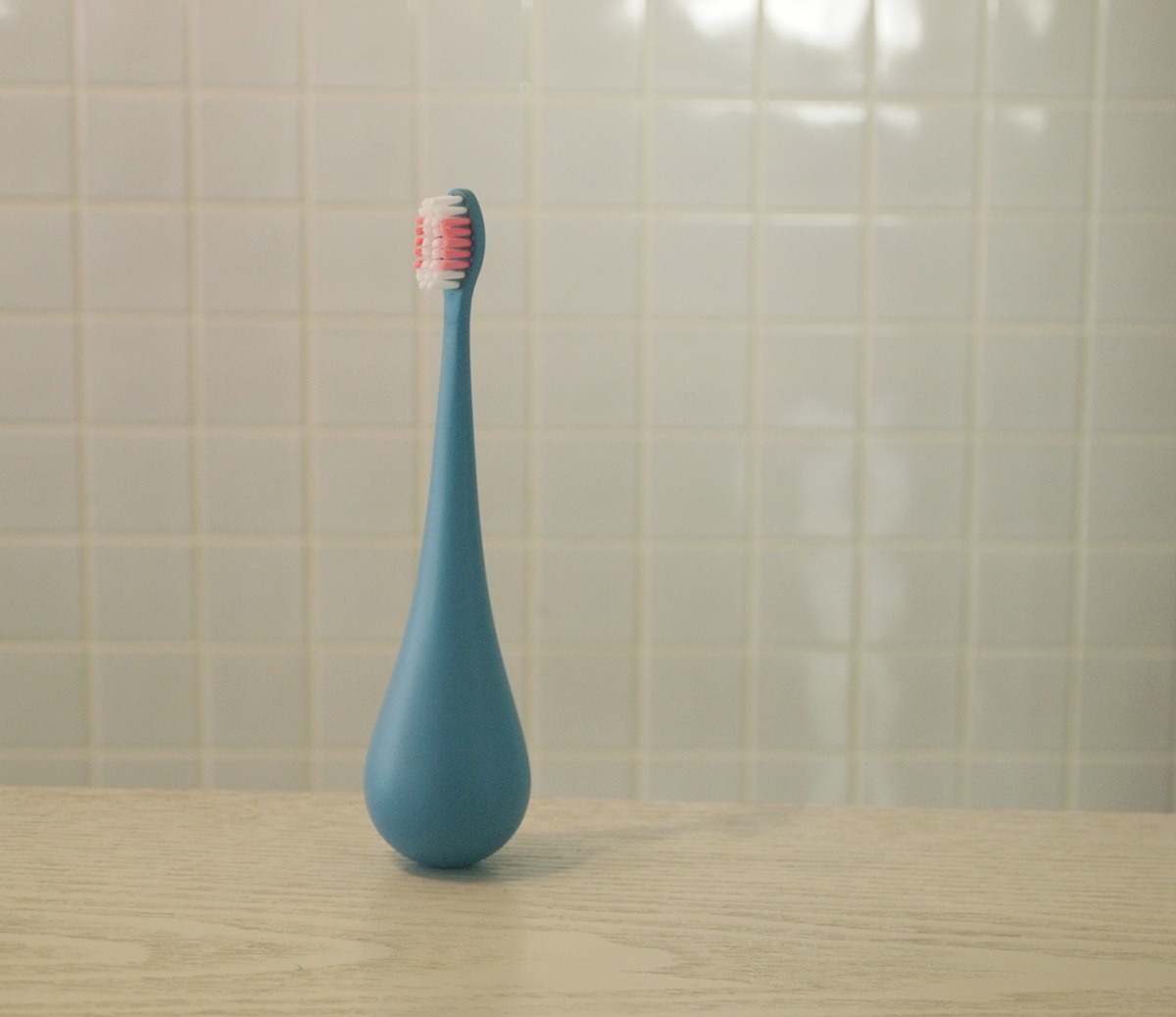stand alone Tooth Brush Red Dot daily product tumble doll