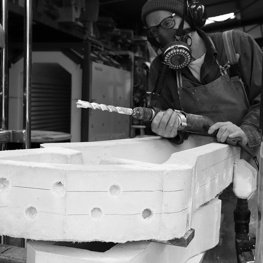 Australian artist Peter Kovacsy making moulds for a casting glass sculpture.