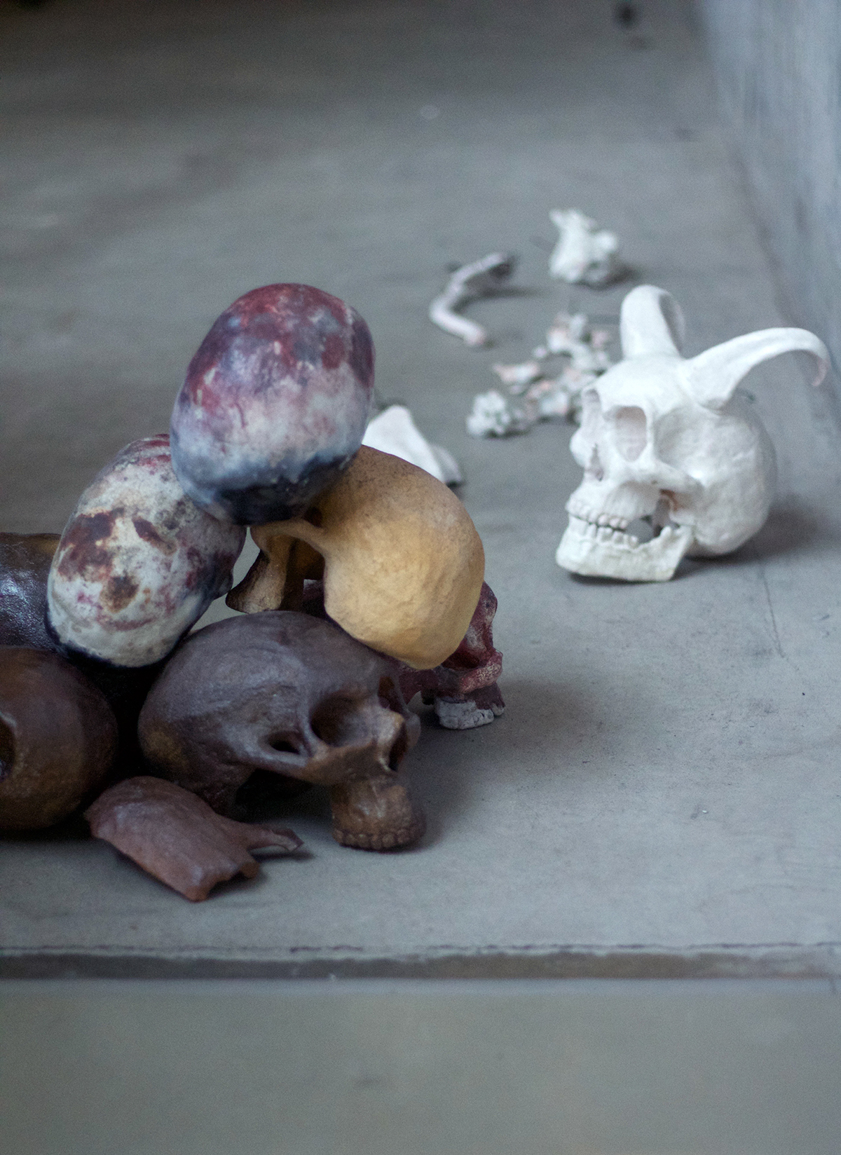 ceramic scultpure pit fire wood fire skulls morbid art undertaker death decay artifact