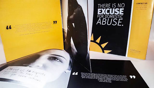 crisis domestic abuse annual report Cayman Islands statistics infographics black & white grayscale yellow Amber book Perfect-bind saddle-stitch
