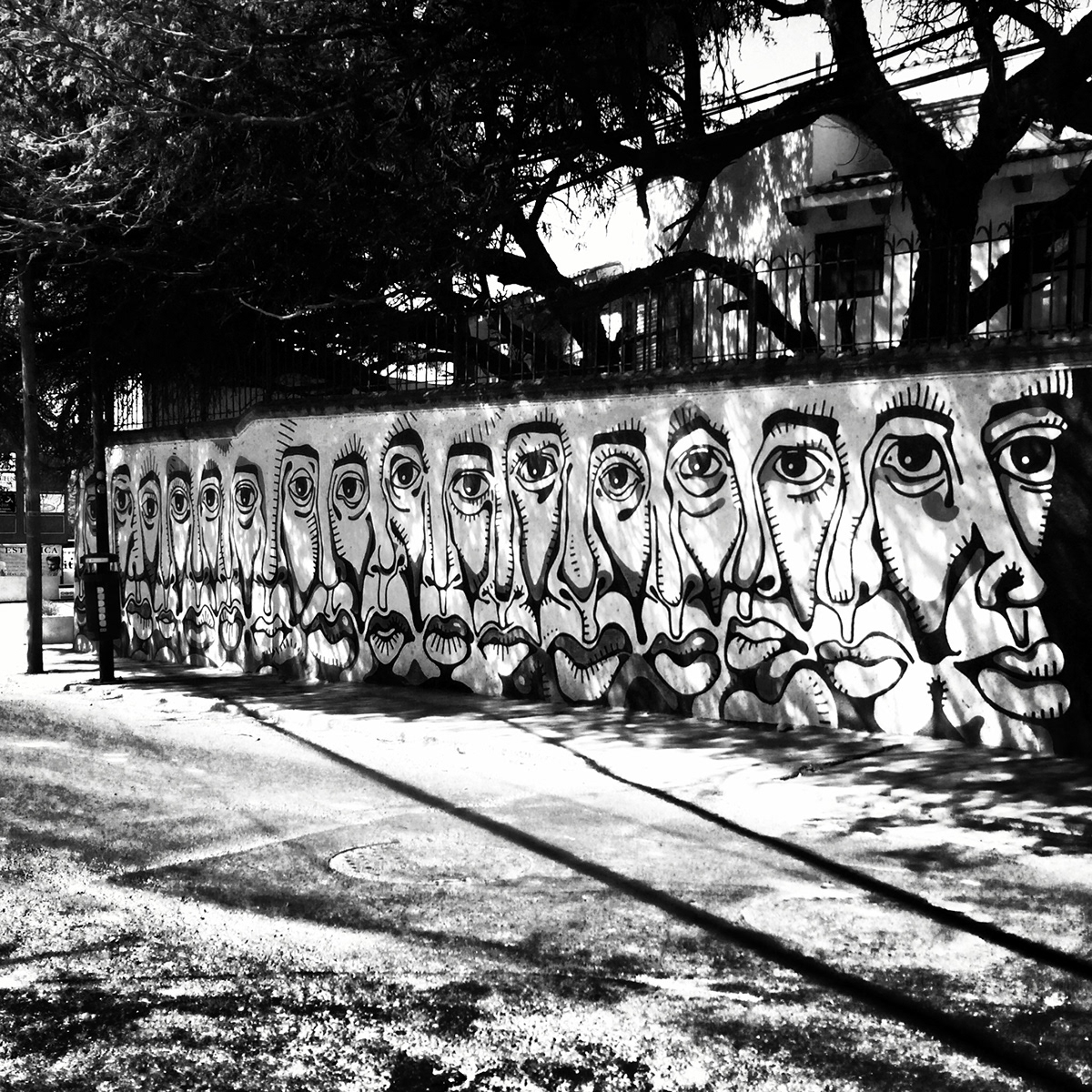 miguelvalinas art streetart Urbanart Mural blackandwhite faces multiplicity espectators Queretaro mexico