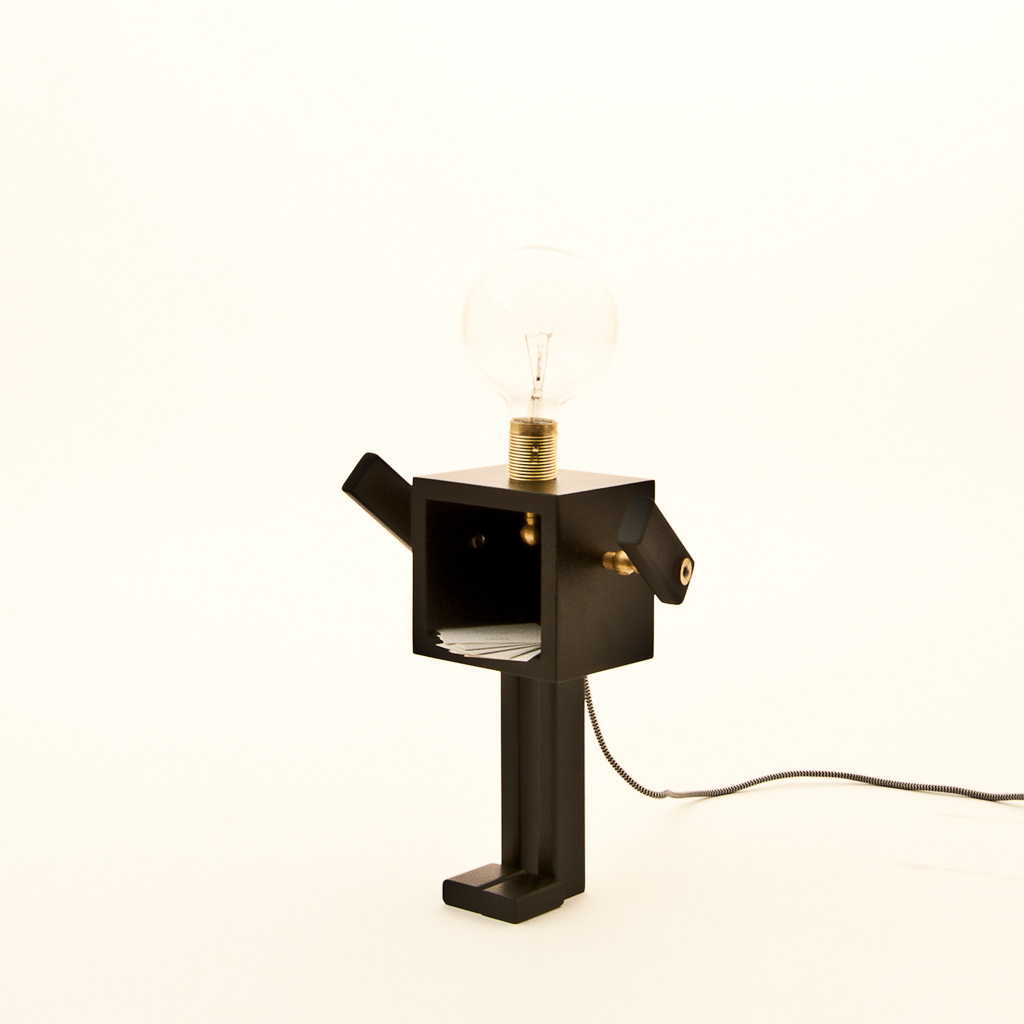 hugme Lamp uncut uncutstudio mattiaghidini withe black bulb hug table light design product Eureka