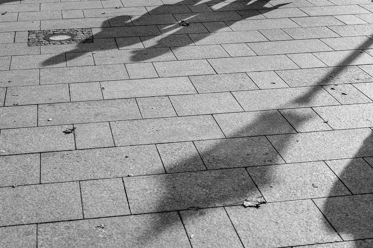 Shadows on the street in Cracow