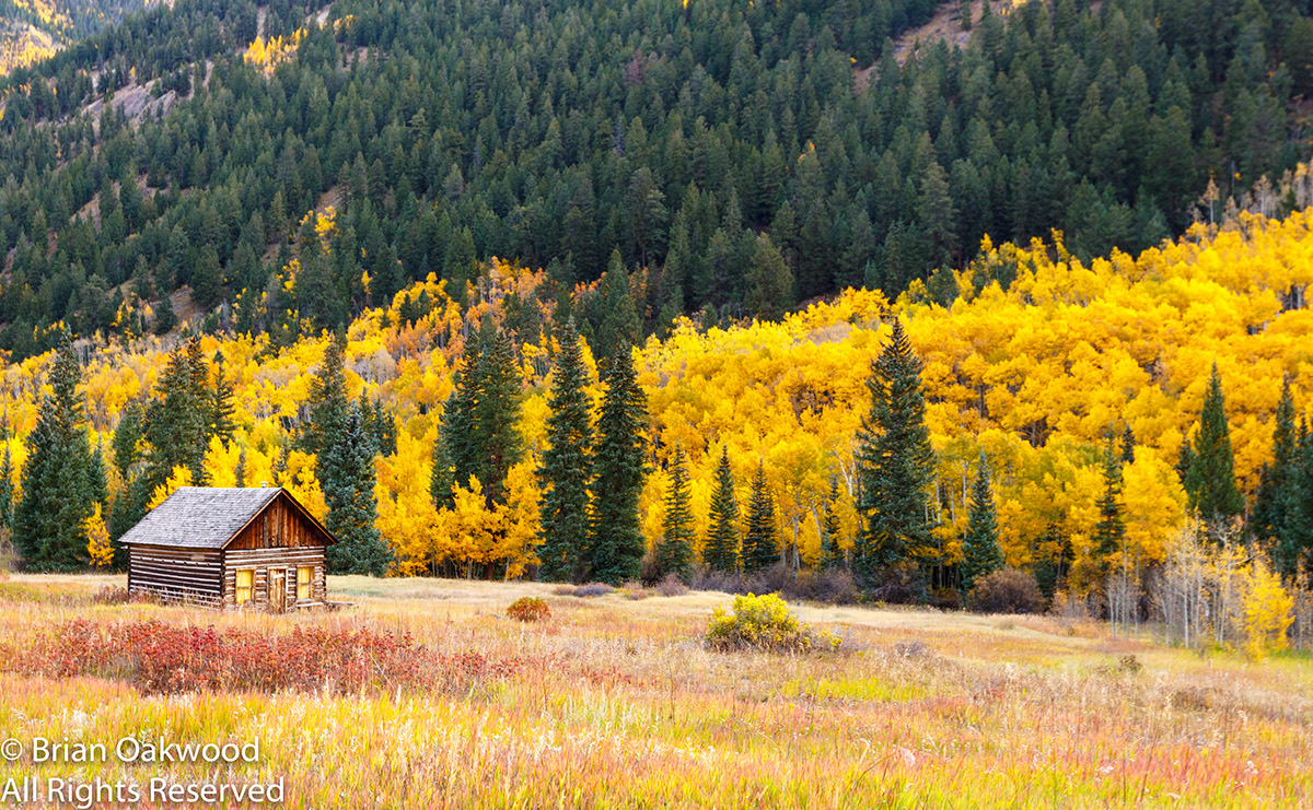 Colorado Rocky Mountains fall color aspens lake stream maroon bells horse wagon