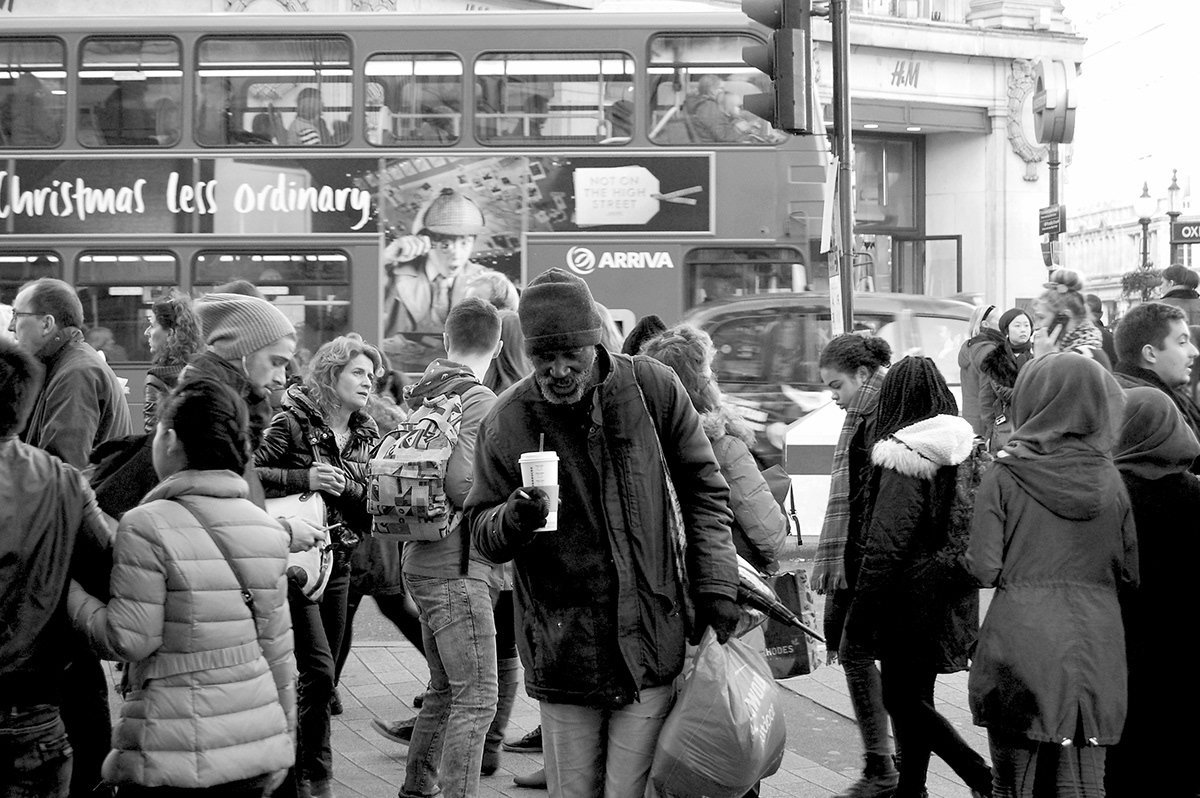 street photo people IN moment brighton London b&w digital crop photoshop edit