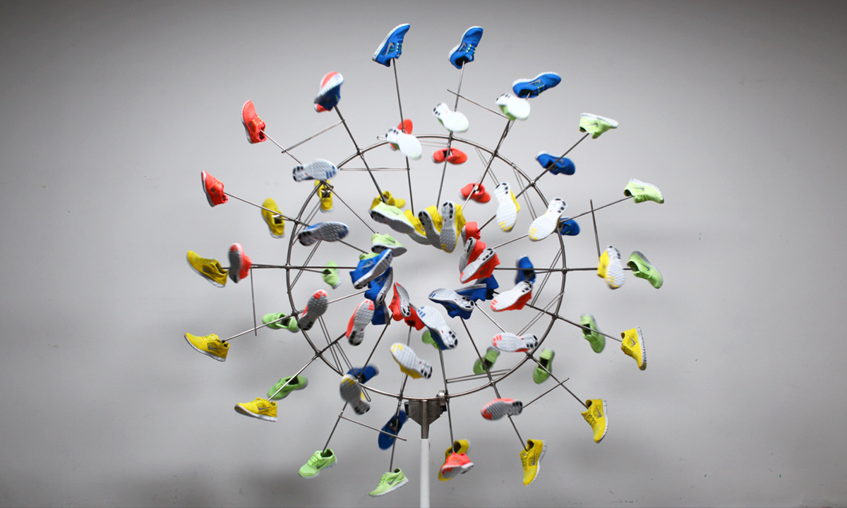 Nike free shoe installation sculpture kinetic rotate Window rainbow colorful motion