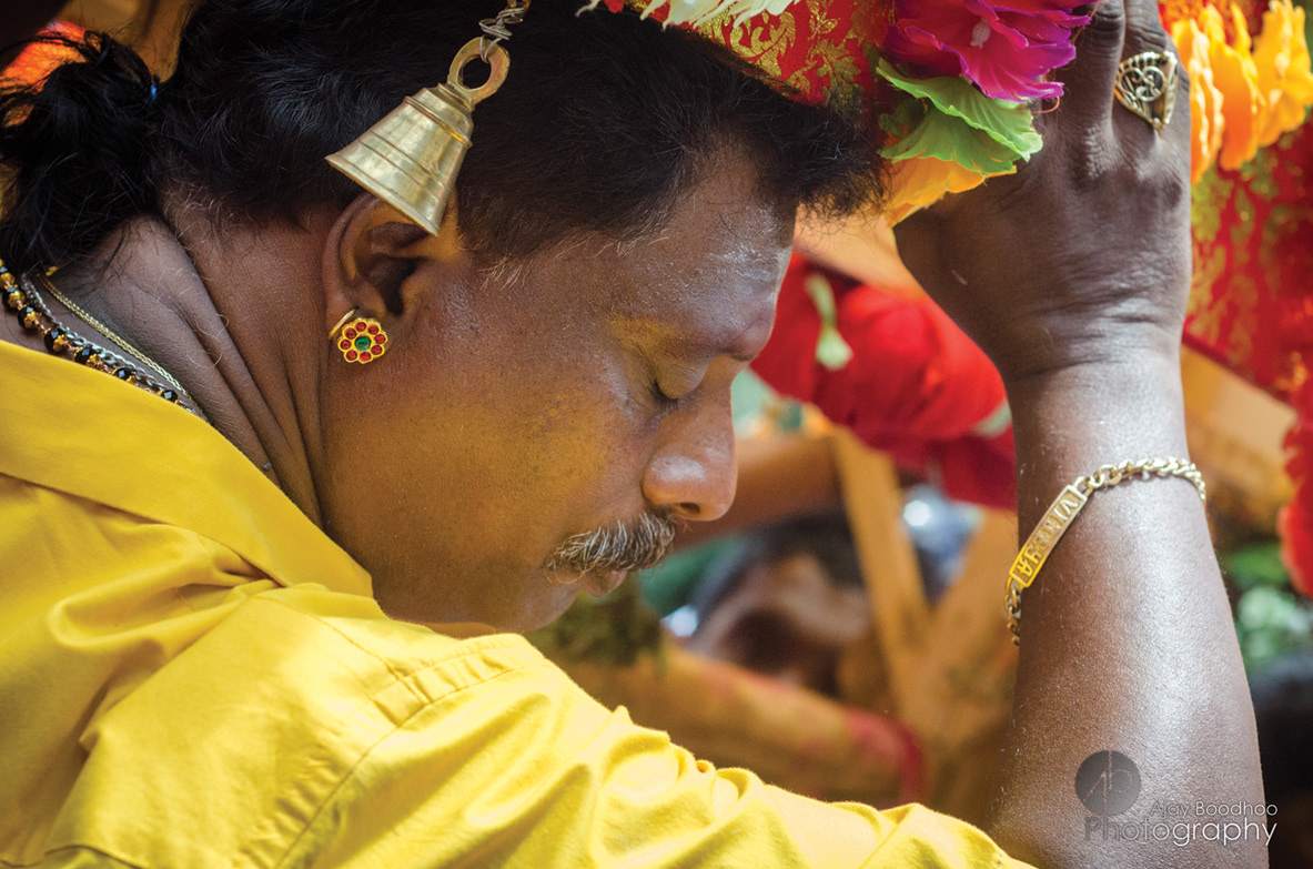 thaipusam cavadee festival mauritius port Louis religious Hindu tamil devotee close up temple
