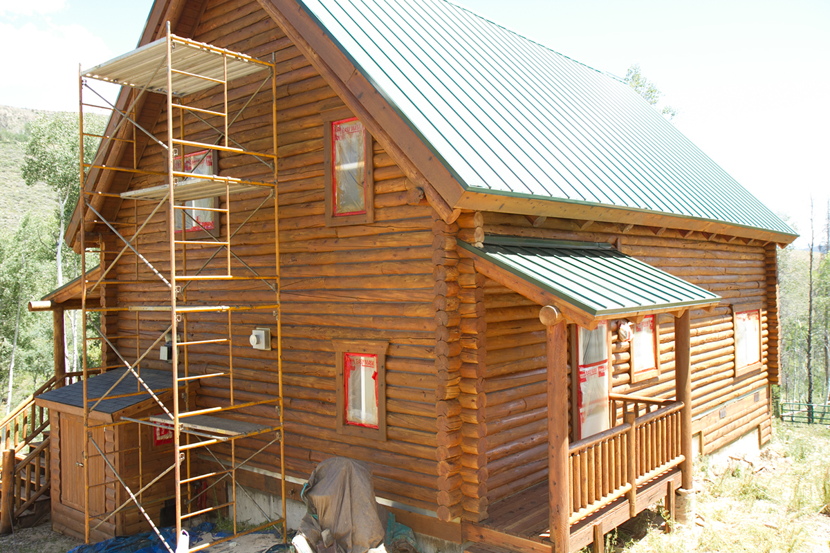 Log Home cabin Log Home Maintenance chinking staining painter media blasting