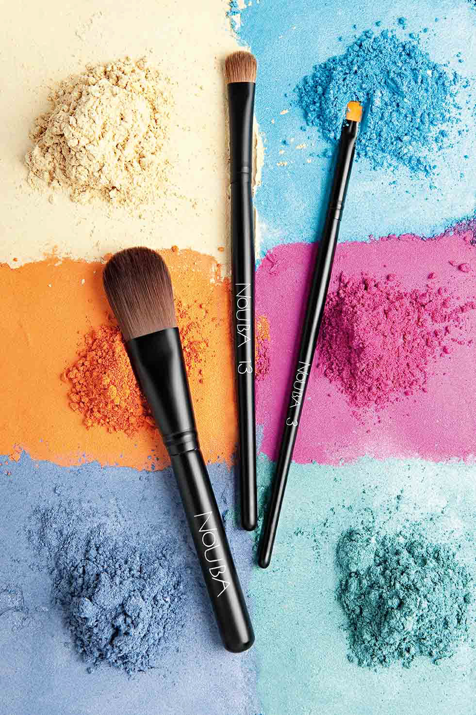 still life Make Up products lipstick mascara foundation powder red blue strips nouba Nouba professional make u Creativity glamour