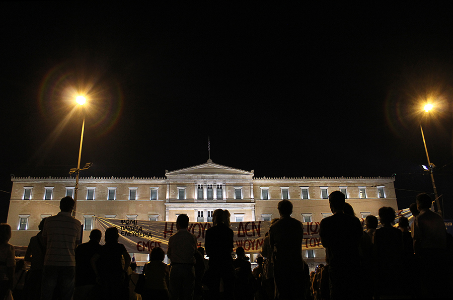 athens Greece crisis parliament revolution night Day riot loukanikos dog riot dog people zero colors road mirror Capitol store bleeding Marble Wired SKY rain