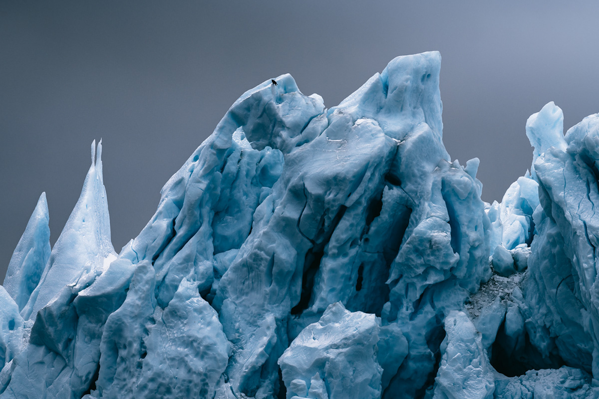 Greenland winter Arctic ice glacier iceberg global warming dark clouds frozen