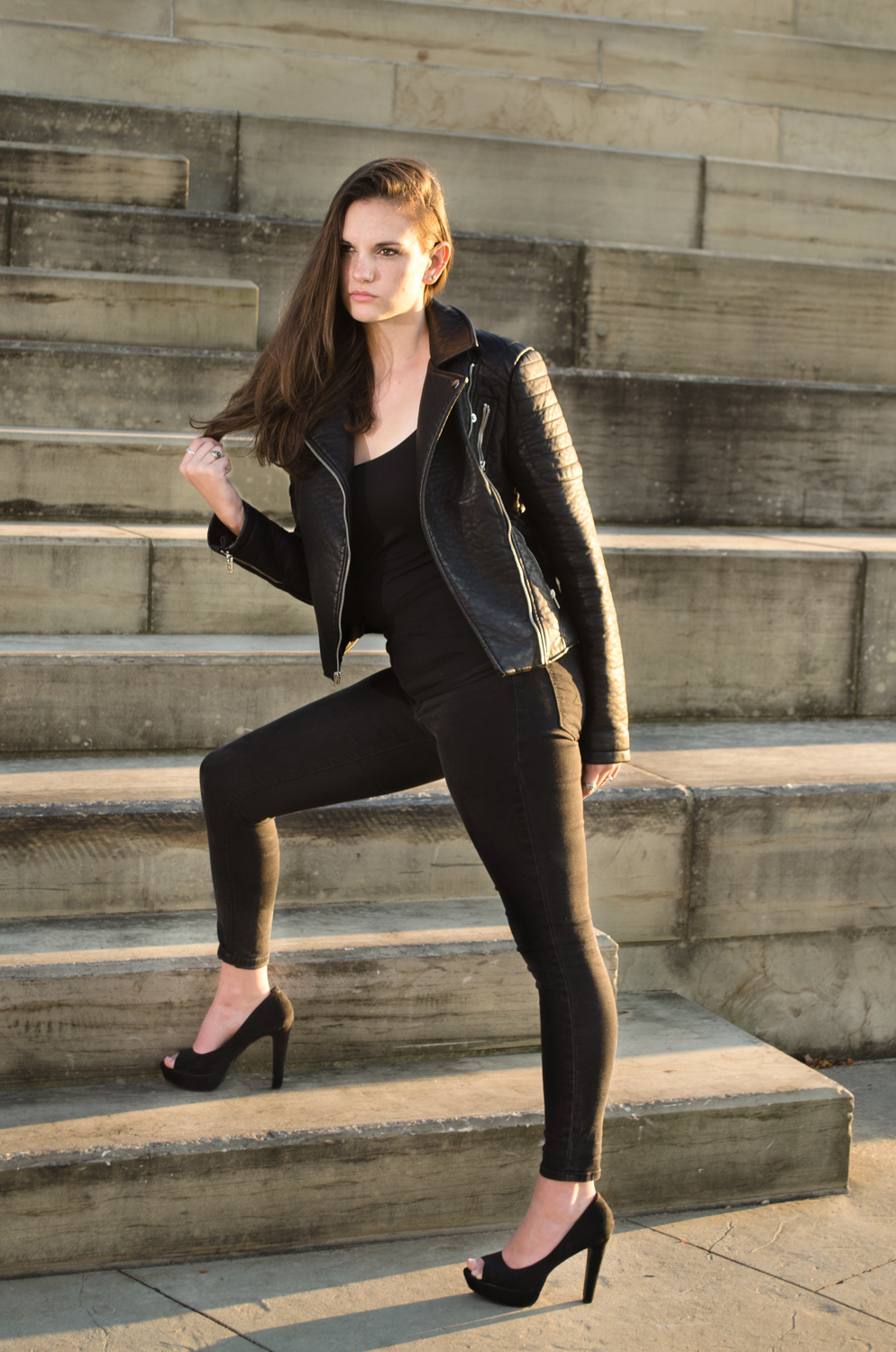 model black outfit heels lines stairs sunlight sun rays